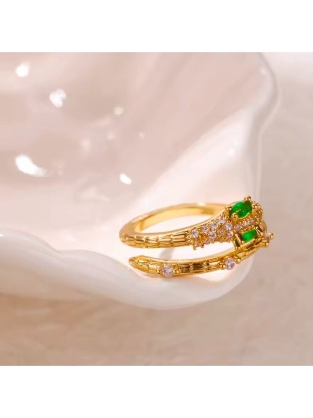 Gold Snake Ring with Emerald Accents